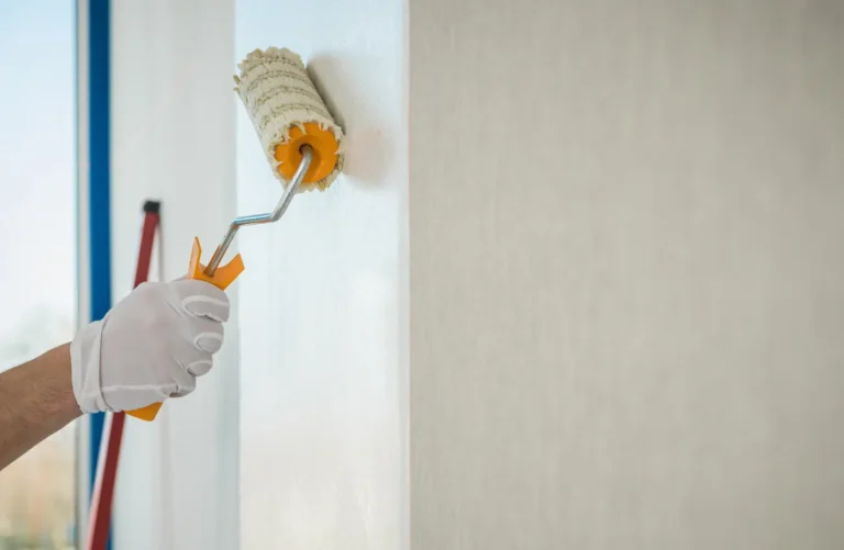 Painting a wall with a roller